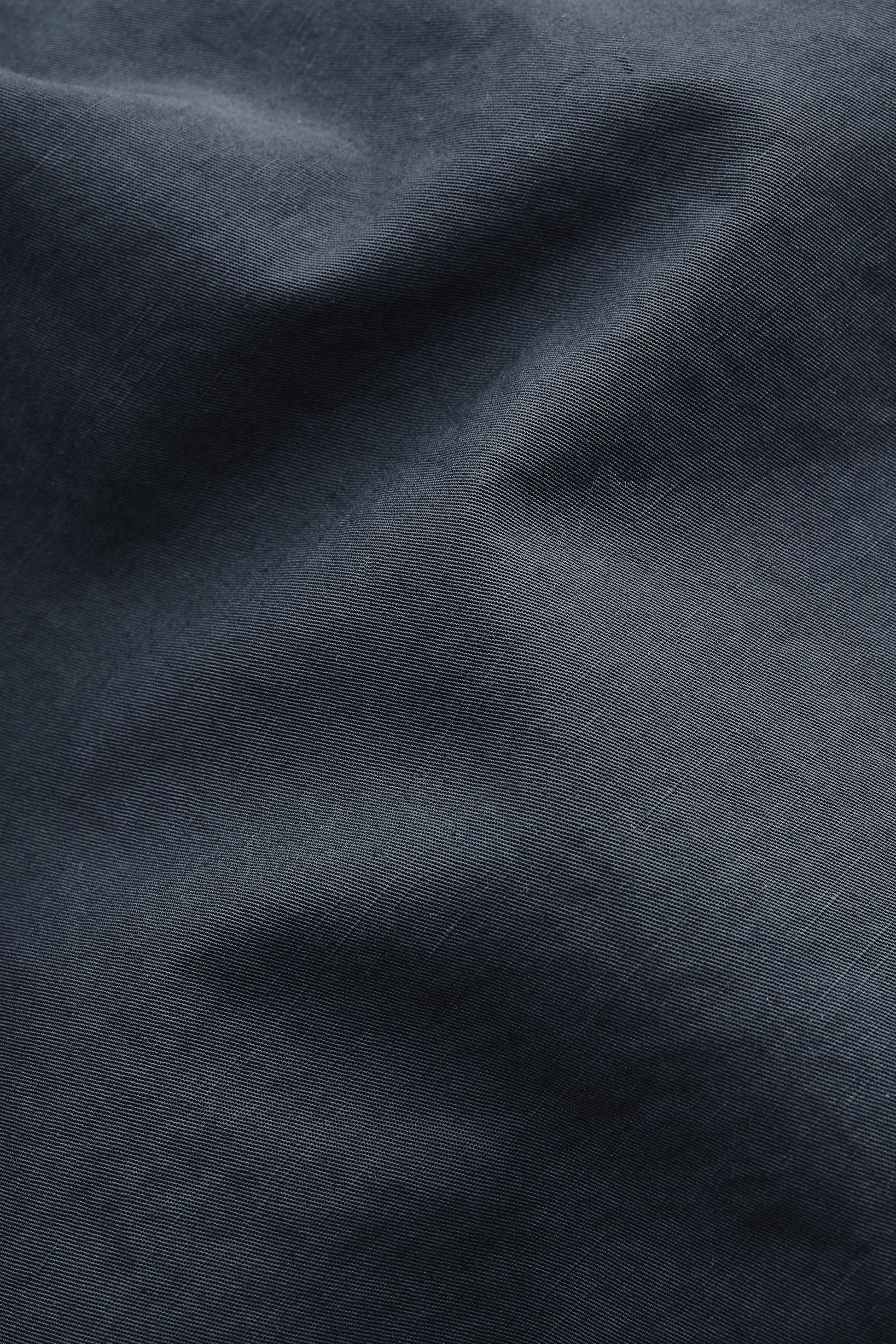 Men's long-pants, cotton-linen blend, garment dyed navy.