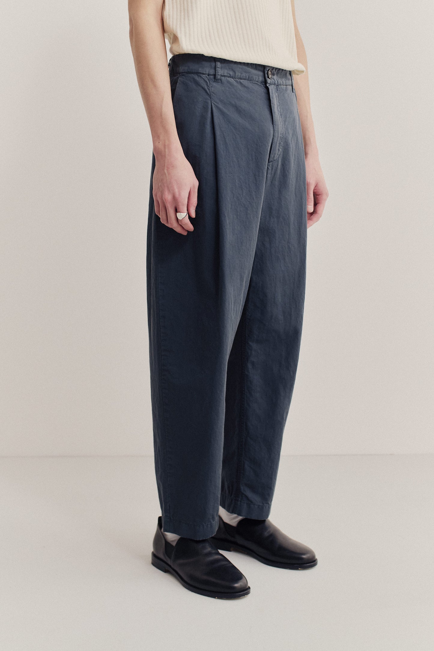 Men's long-pants, cotton-linen blend, garment dyed navy, loose tapered leg, single front pleat.