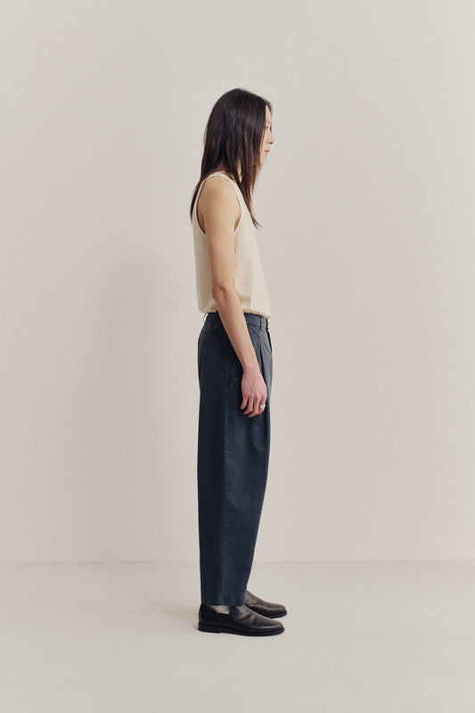 Men's long-pants, cotton-linen blend, garment dyed, navy, with single pleat and tapered leg.