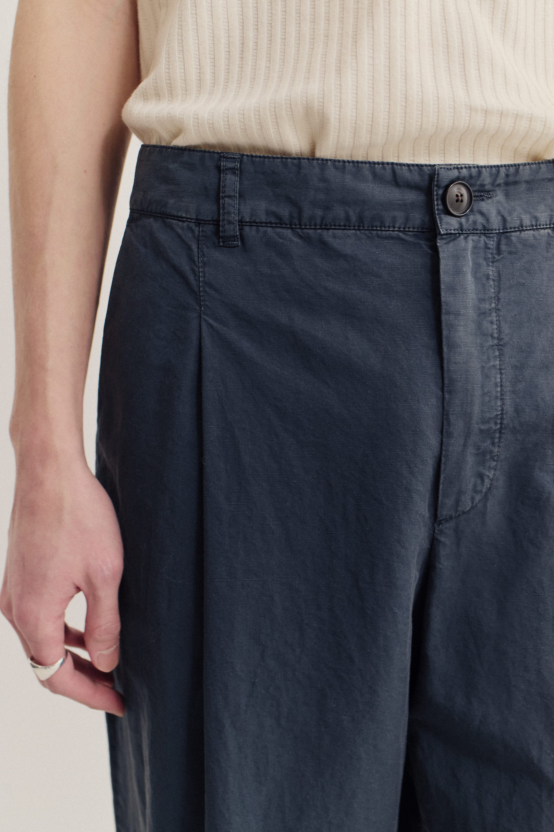 Men's long-pants, cotton-linen blend, garment dyed navy, with single front pleat and belt loops.