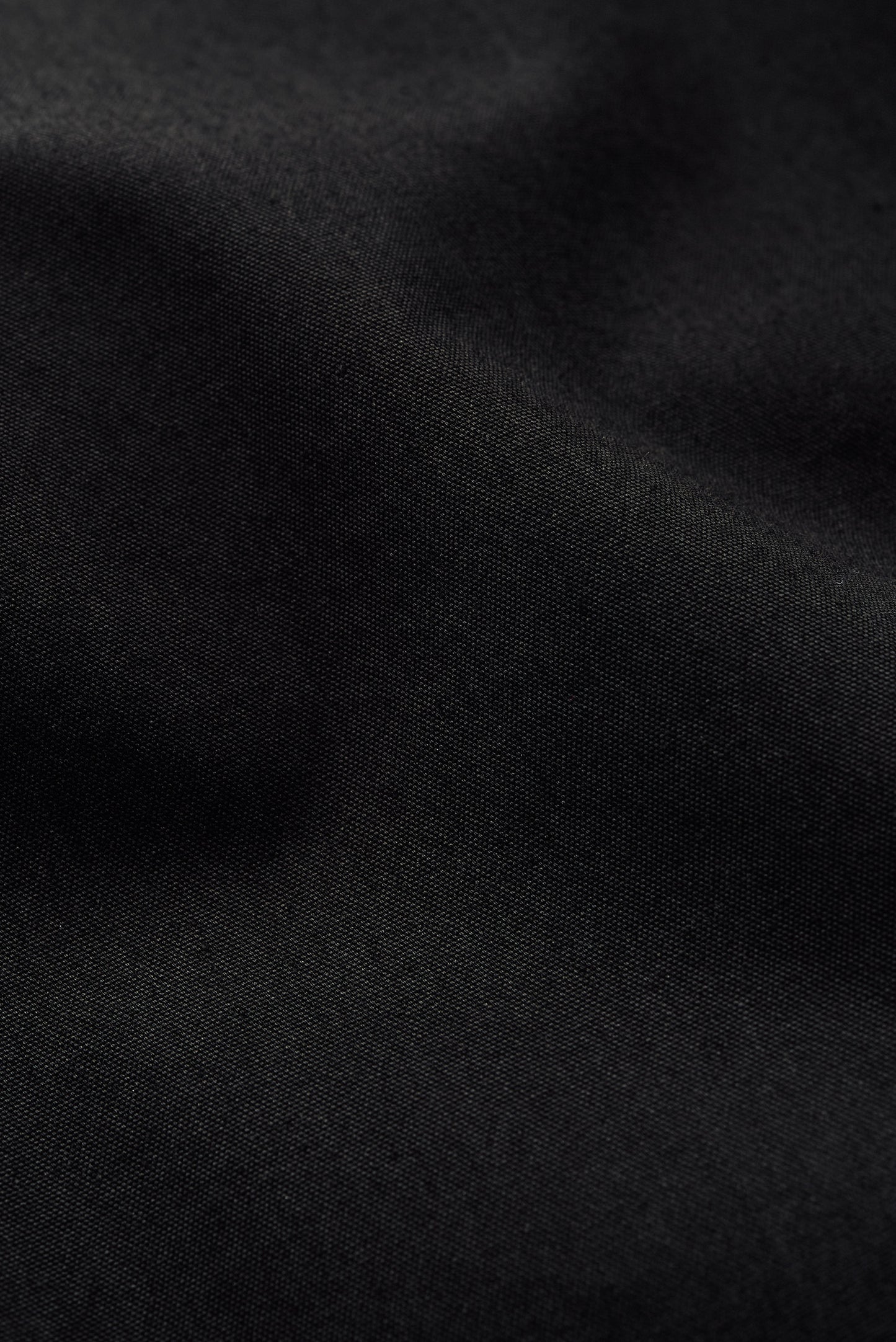 Women's outerwear jacket, black water-repellent cotton blend with a soft, slightly waxed hand feel.