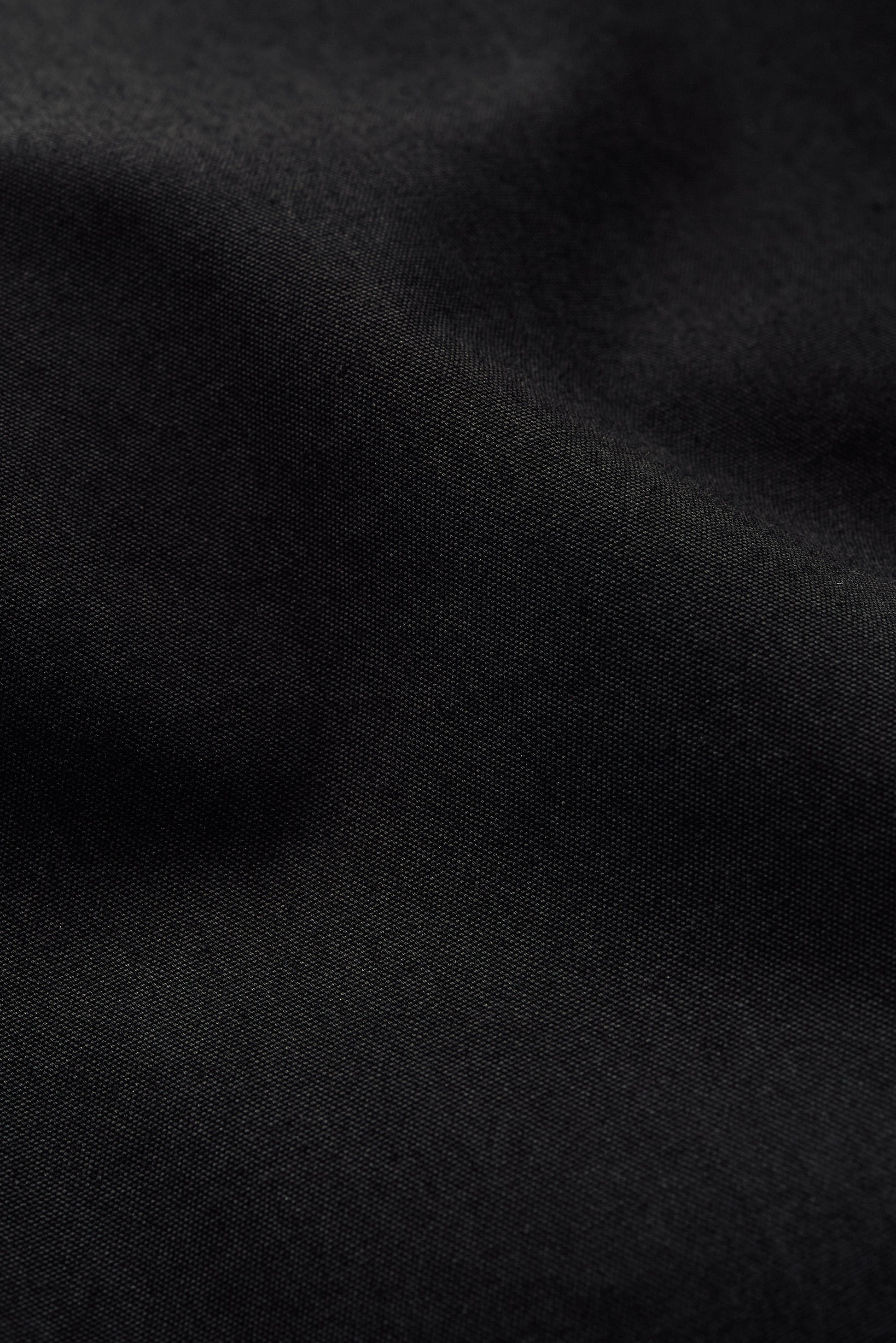 Women's outerwear jacket, black water-repellent cotton blend with a soft, slightly waxed hand feel.