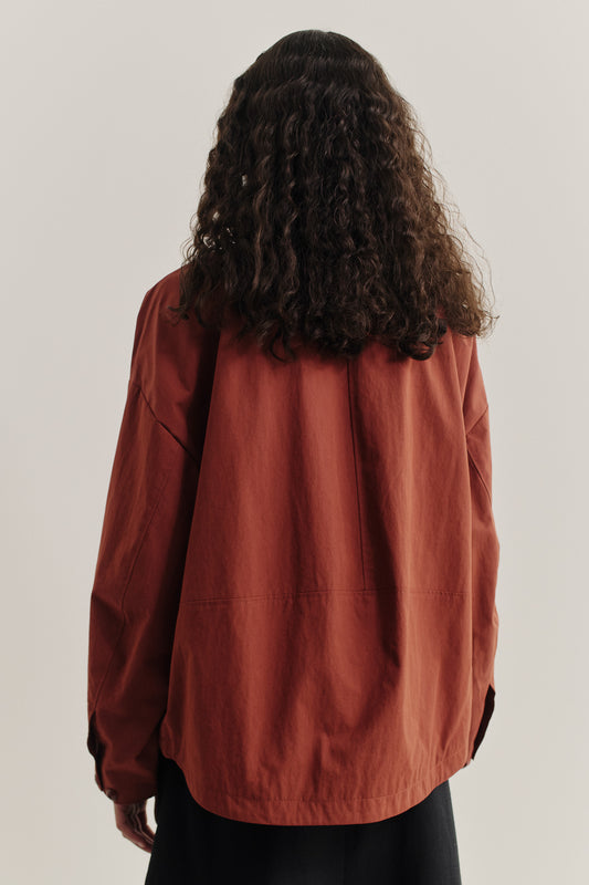 Women's outerwear, KIBERA JACKET, water-repellent cotton blend, brick red, with a wide-cut silhouette and dropped shoulder.