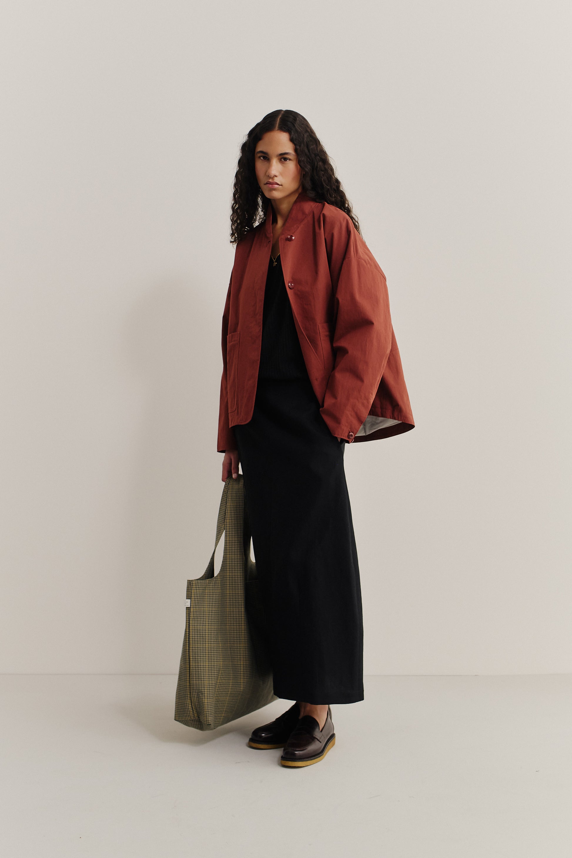 Women's outerwear, KIBERA JACKET, rust cotton blend, wide-cut silhouette, with front patch pockets.