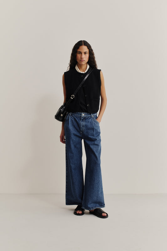 Women's knit vest, 100% fine merino wool, black, with ajour knit pattern and cropped silhouette.