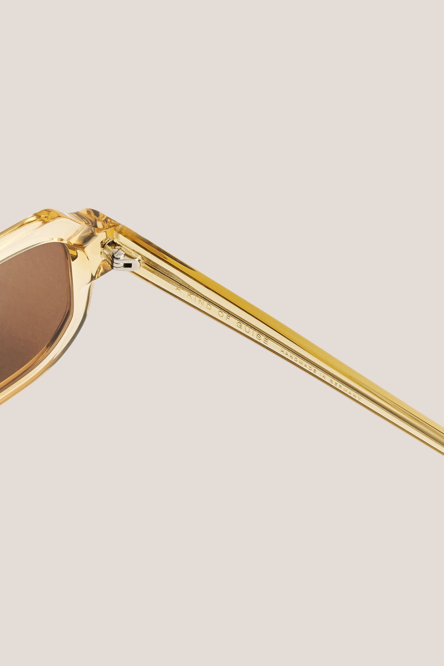 Unisex accessories sunglasses, transparent yellow acetate frame, brown Carl Zeiss lenses, handmade in Germany.