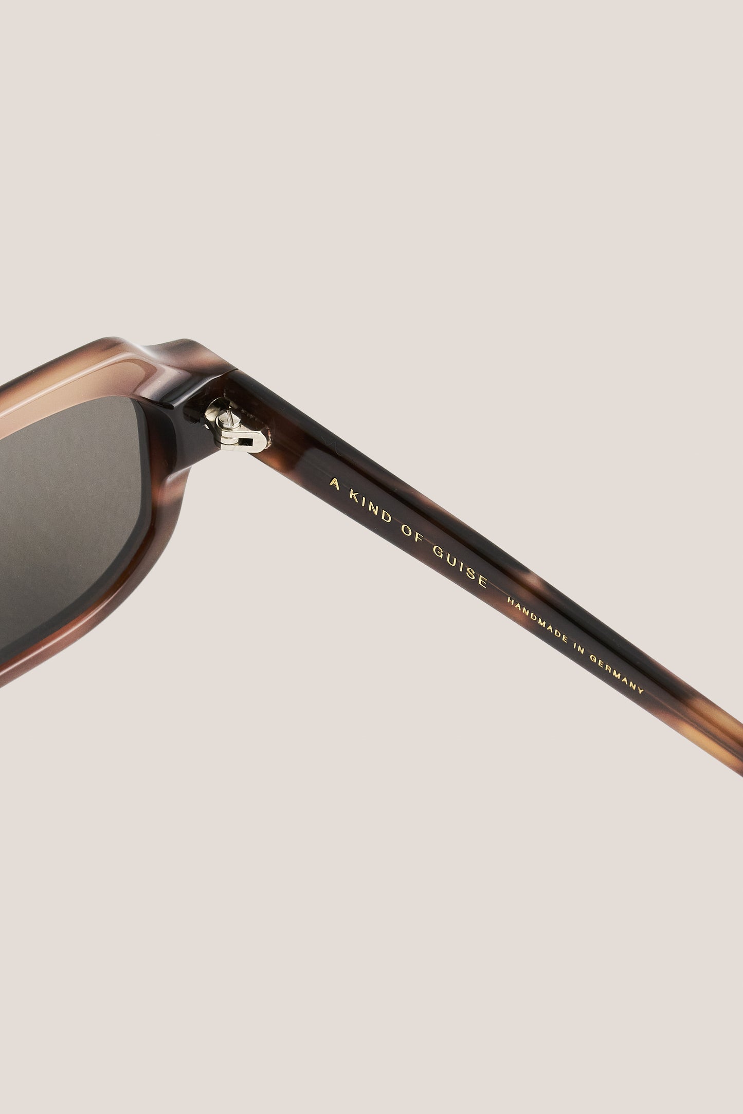 Unisex accessories sunglasses, acetate, tortoiseshell, rectangular frame with rounded edges and dark lenses.