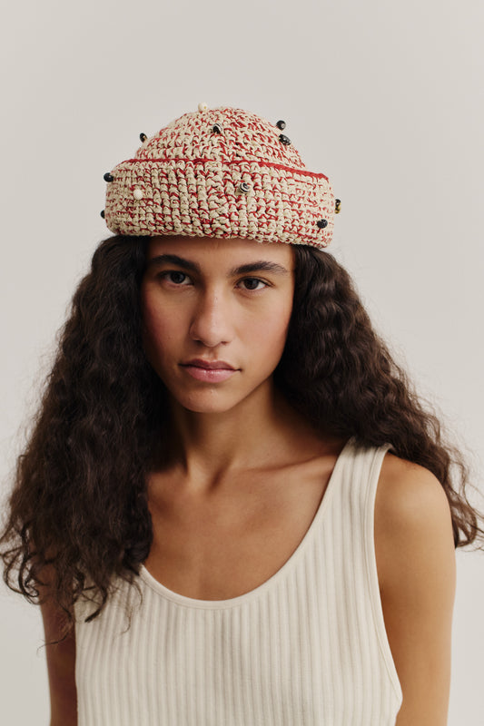 Women's accessories, Luo Crochet Cap, viscose-linen-cotton blend, red and natural raffia-like, decorated with mussels and wooden beads.