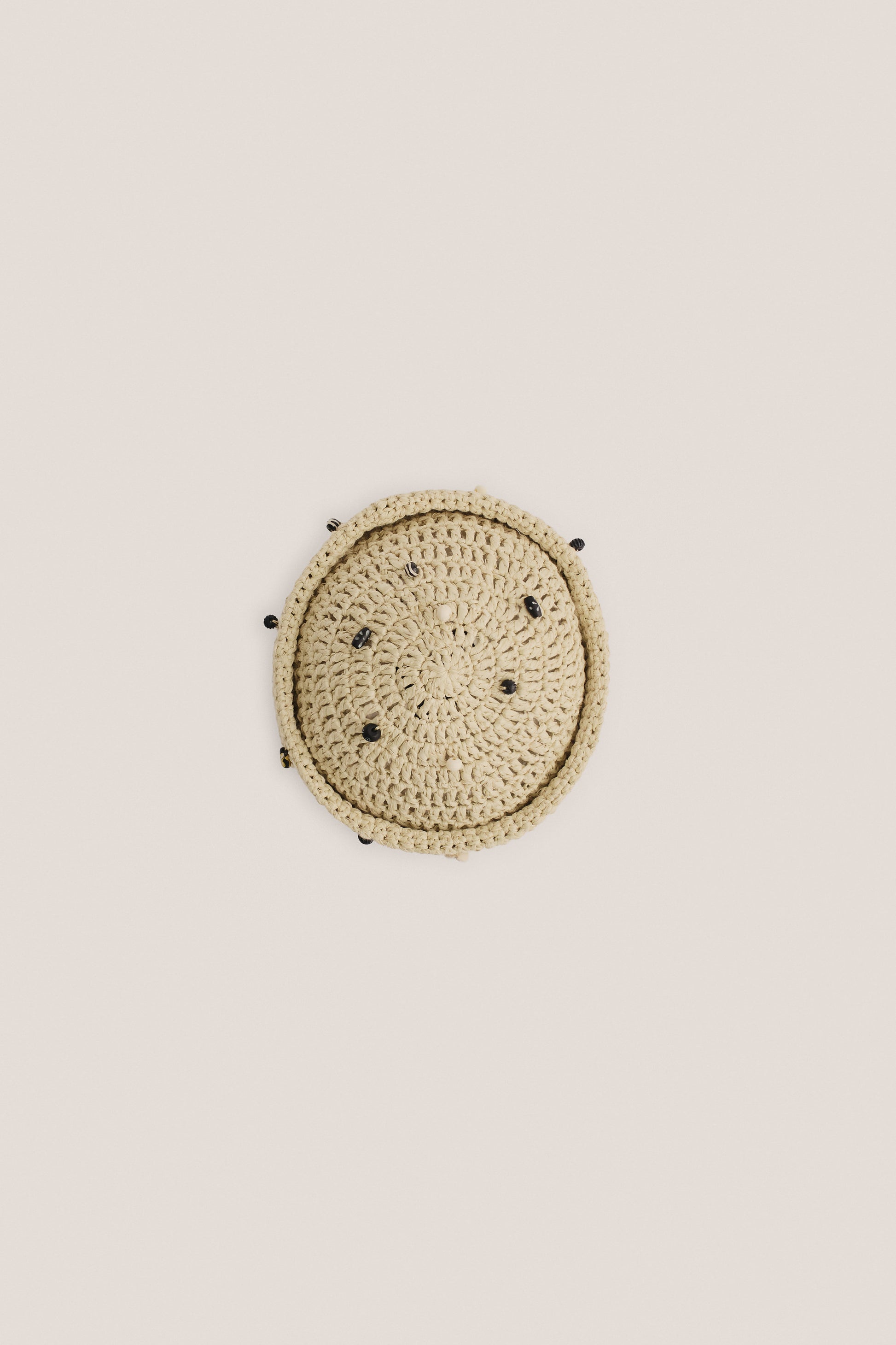 Women's accessories, Luo Crochet Cap, viscose-linen-cotton blend, natural beige, decorated with mussels and wooden beads.