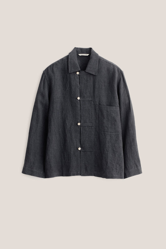 Men's long-sleeved overshirt, dark grey linen with vintage texture, front patch pocket, and button fastening.