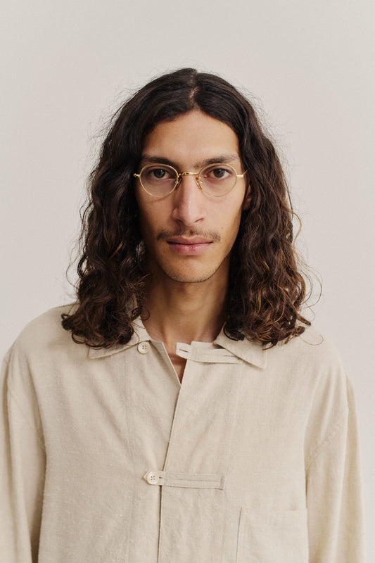 Men's long-sleeved overshirt, linen-silk blend, undyed natural beige, with front patch pocket and button fastening.