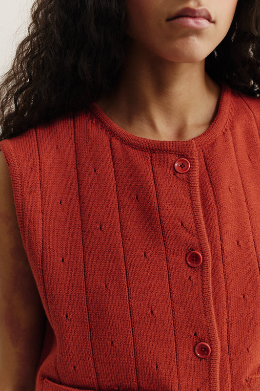 Women's knit vest, 100% merino wool, ajour knit pattern, button-front, rib-knit trim, terracotta.