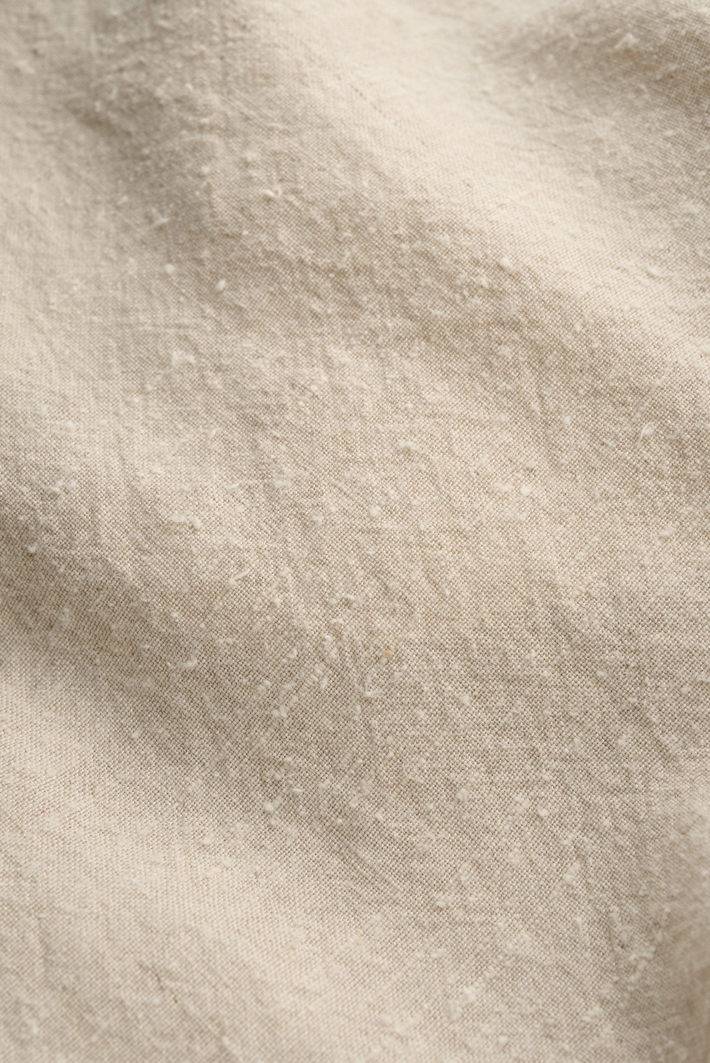 Women's tailoring blazer, linen-silk blend, naturally textured, unbleached mambrui sand fabric.