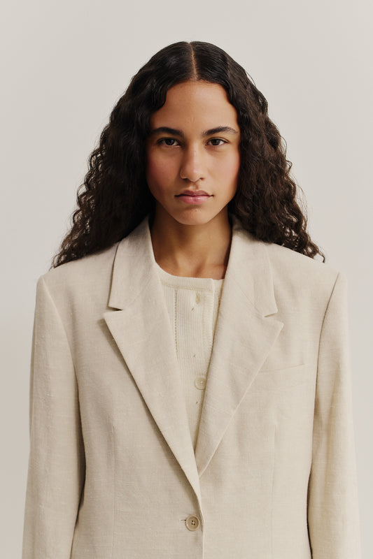 Women's tailoring blazer, linen-silk blend, naturally textured, mambrui sand, oversized fit with wide lapel.