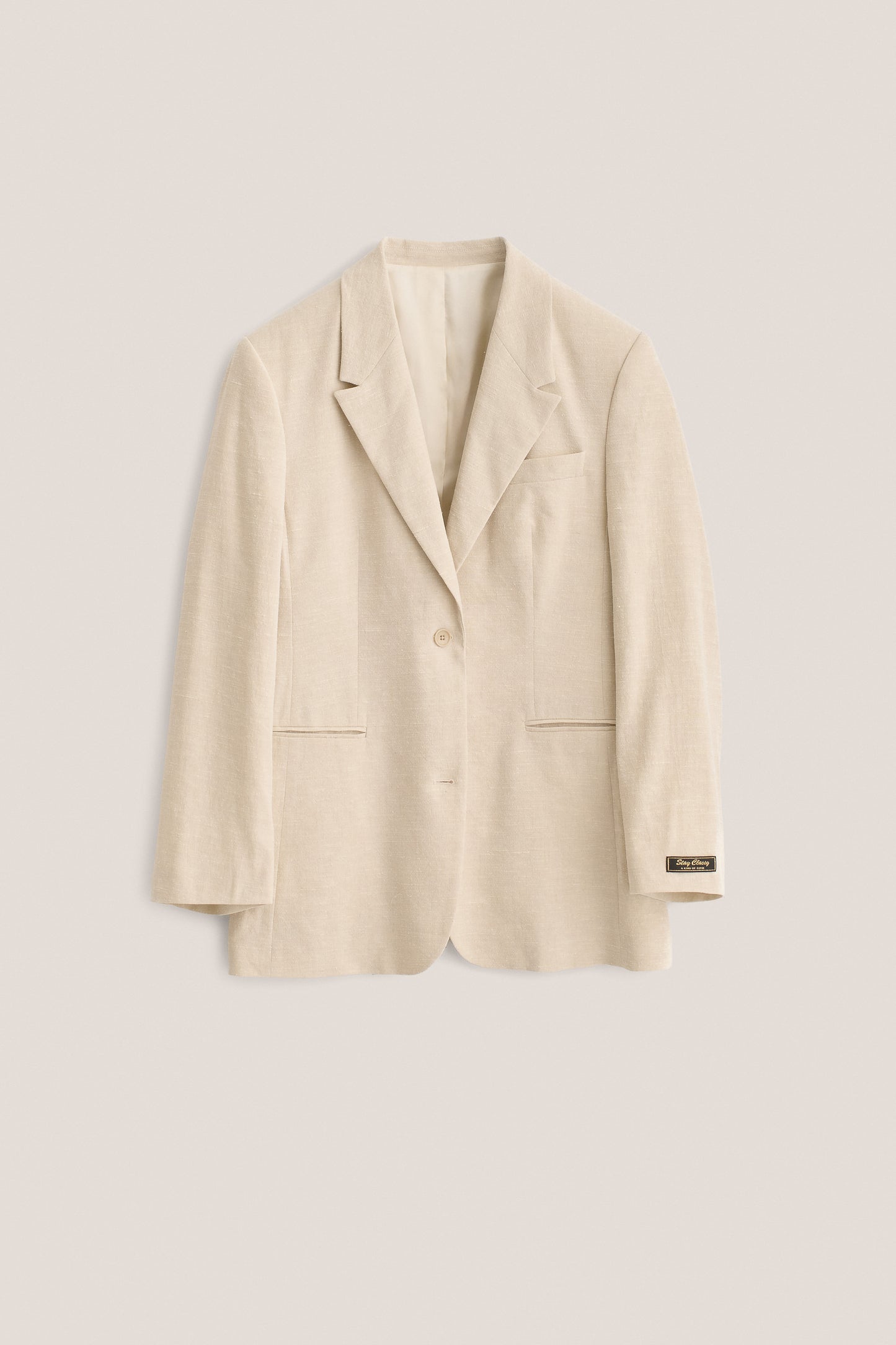 Women's tailoring blazer, linen-silk blend, mambrui sand, oversized fit, wide lapel, two welt pockets.