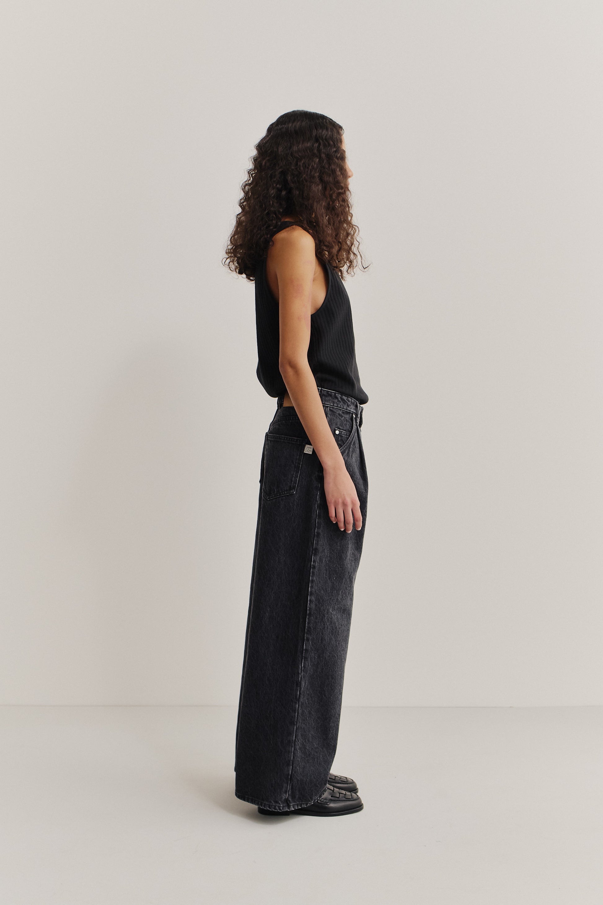 Women's long-pants, organic cotton denim, stone washed, dark grey, pleated, wide leg.