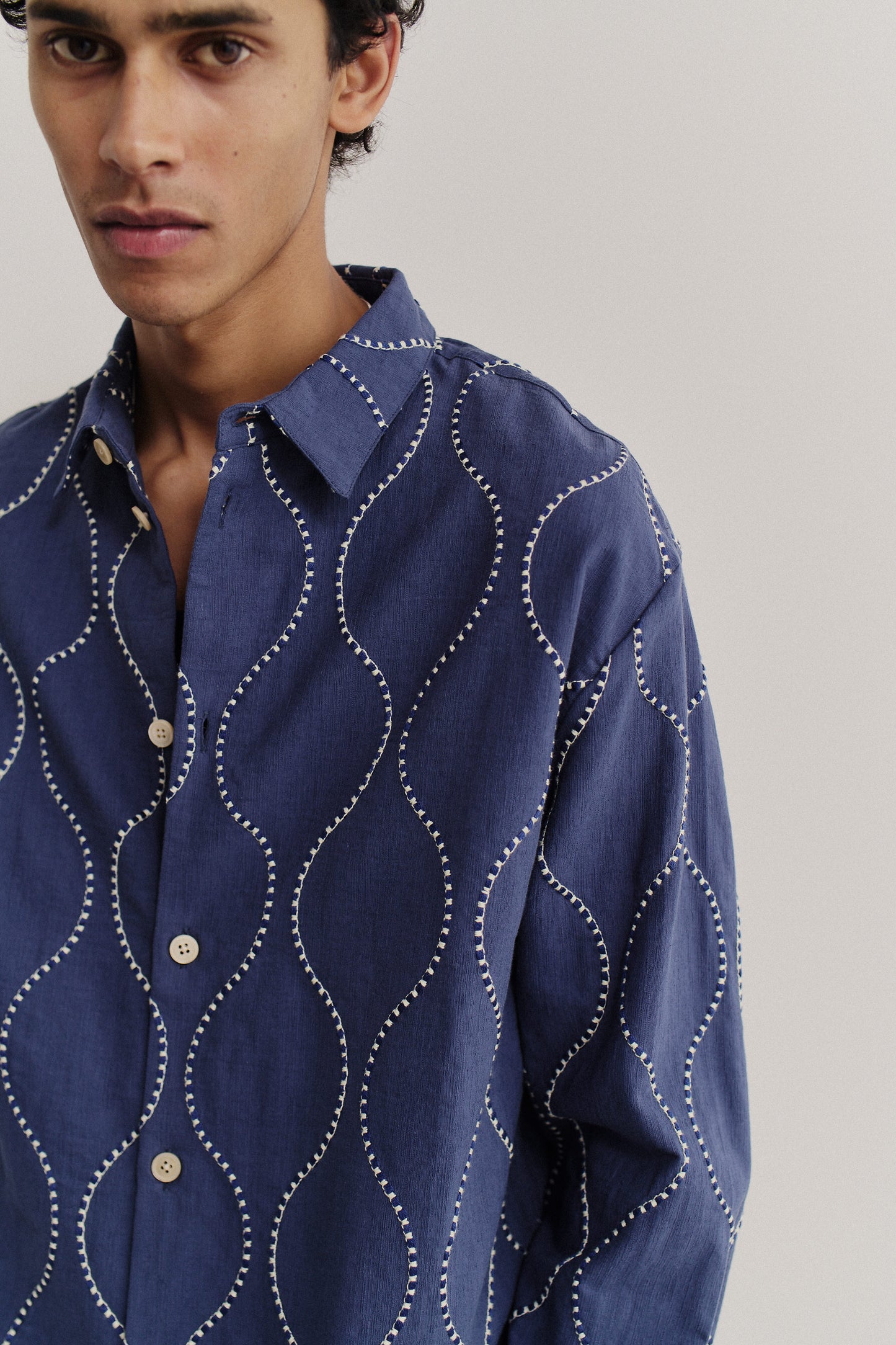 Men's long-sleeved shirt, oversized cotton, navy with white wavy embroidered pattern.