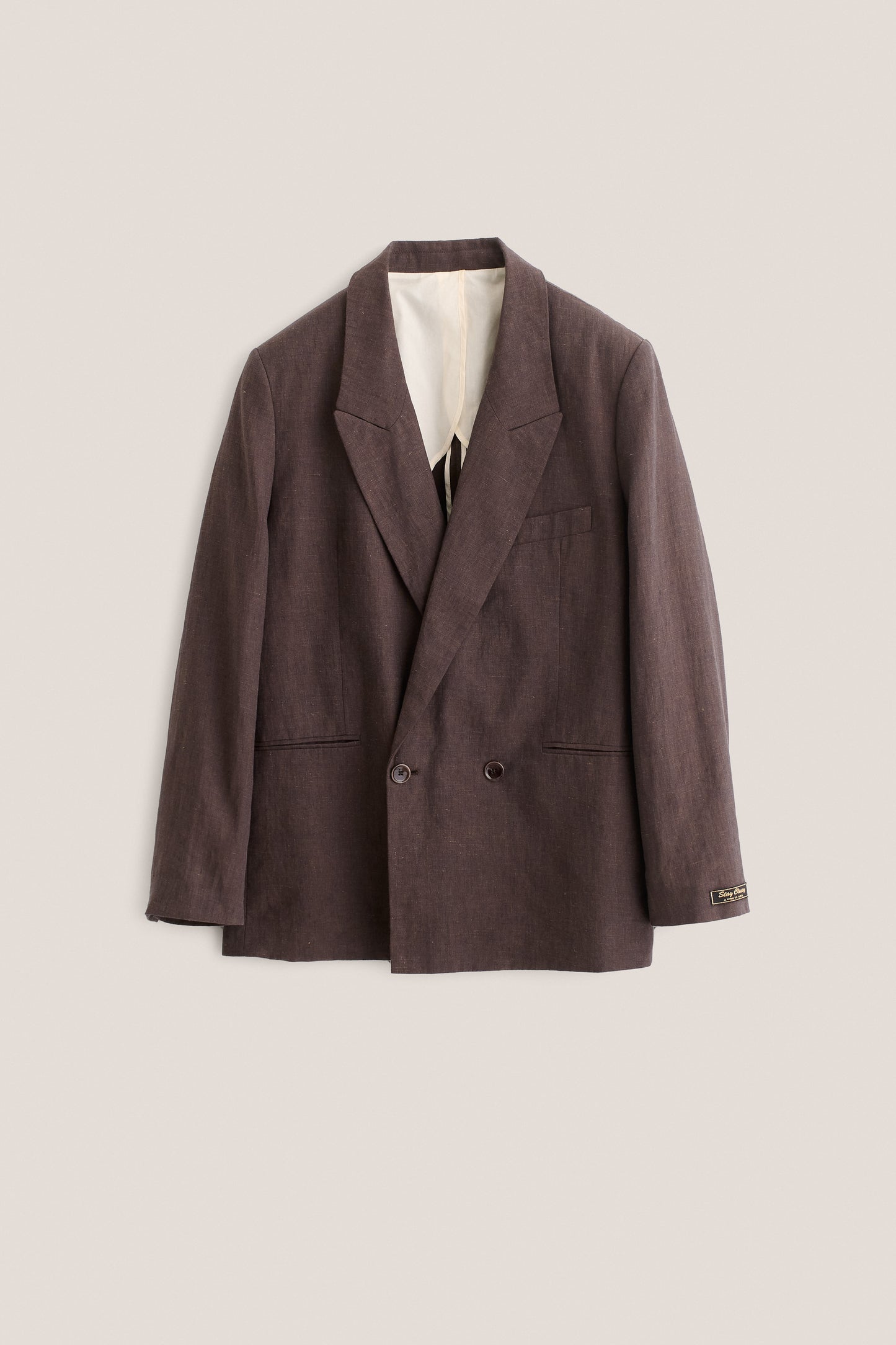 Men's tailoring, double-breasted blazer, 100% linen, burnt umber, relaxed fit.
