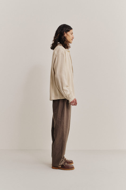 Men's long-sleeved shirt, recycled cotton-linen blend, herringbone pattern, off-white with brown stripes.