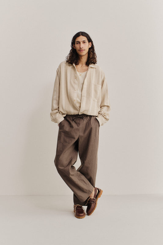 Men's long-sleeved shirt, recycled cotton-linen blend, herringbone with off-white stripes, soft brown.
