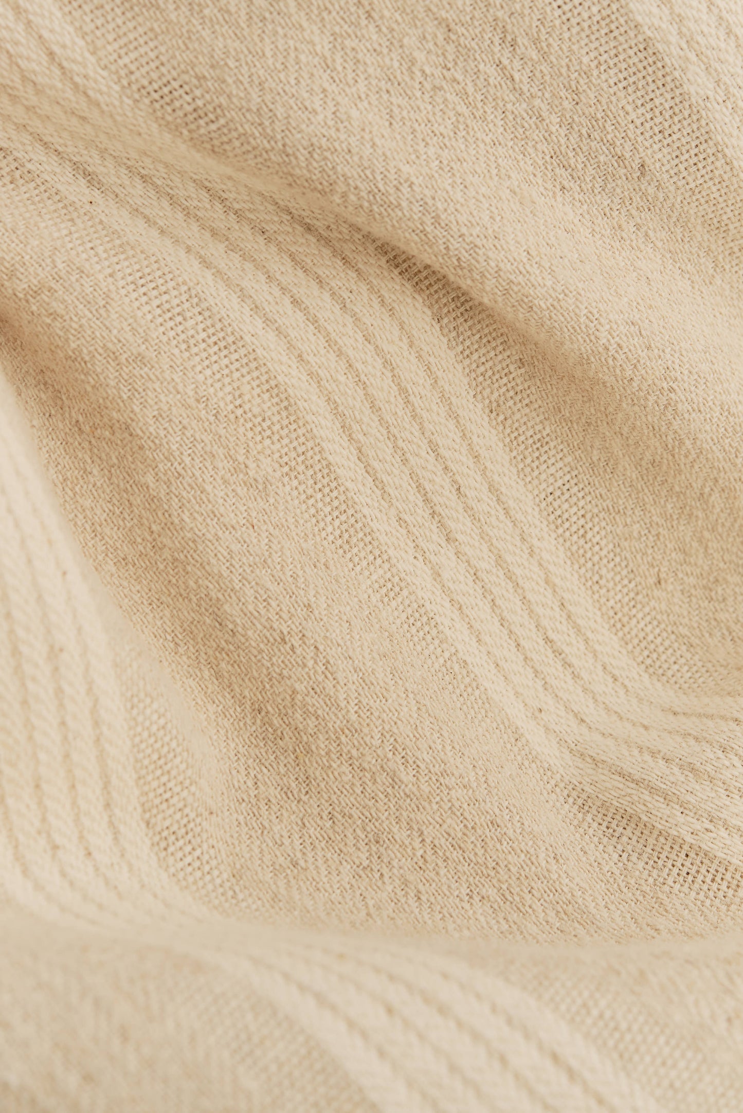 Men's long-sleeved shirt, recycled cotton linen blend, herringbone pattern with off-white stripes, soft brown.