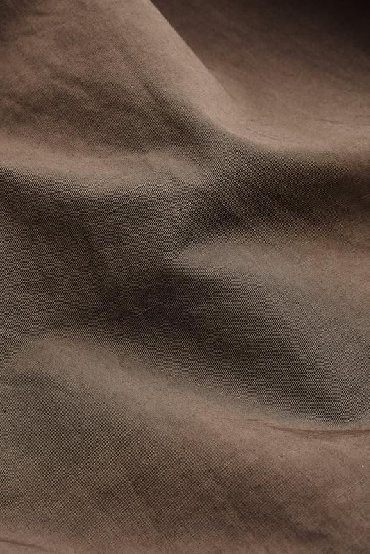 Men's shorts, cotton-linen blend, garment-dyed brown, with a relaxed fit and natural texture.