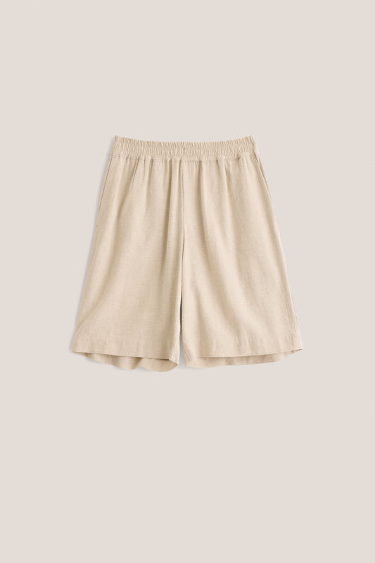 Unisex shorts, linen-silk blend, undyed natural beige, wide leg, elastic waist, side pockets.