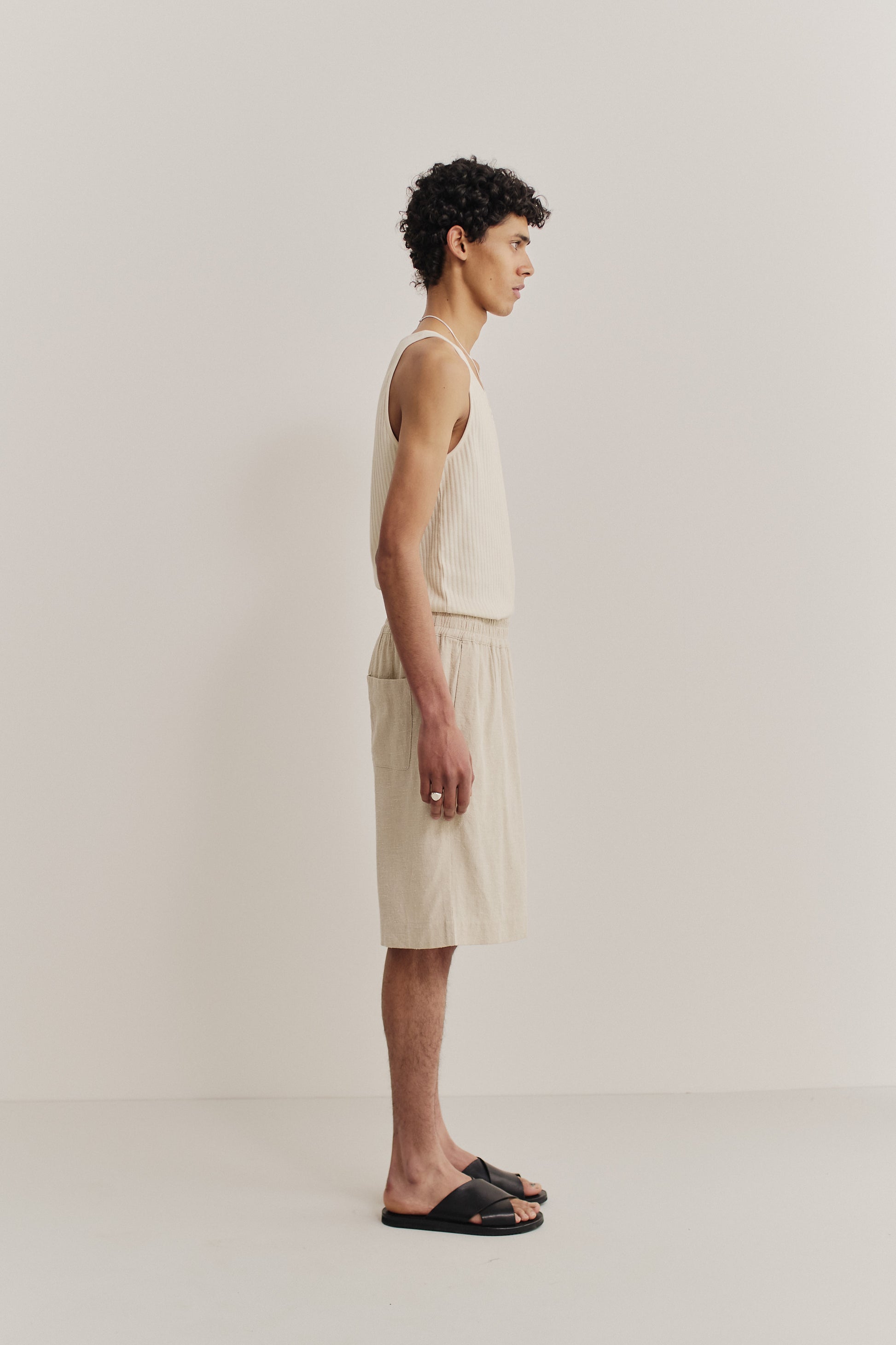Unisex shorts, linen-silk blend, undyed natural beige, wide leg, elastic waist, side pockets.