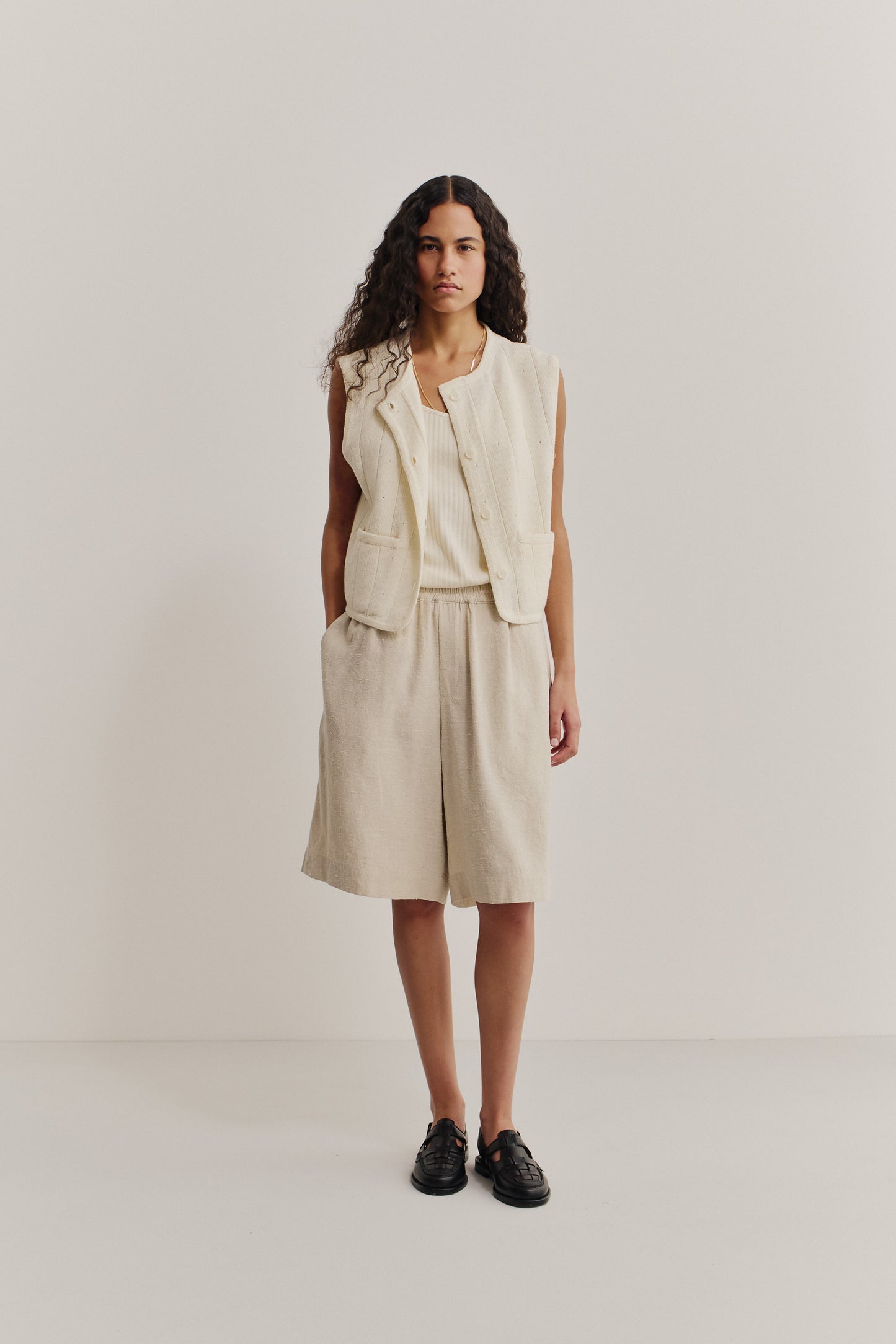 Unisex shorts, linen and silk blend, naturally textured, undyed, unbleached, relaxed fit, wide leg, elastic waist, side pockets, patch pocket, natural.