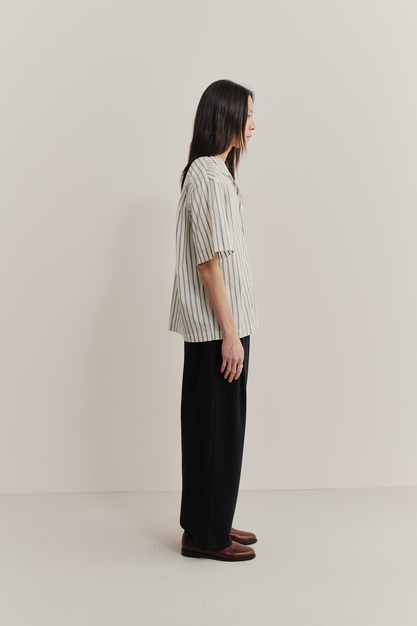 Men's short-sleeved shirt, cotton-silk-linen blend, washed finish, striped, off-white with subtle green stripes.