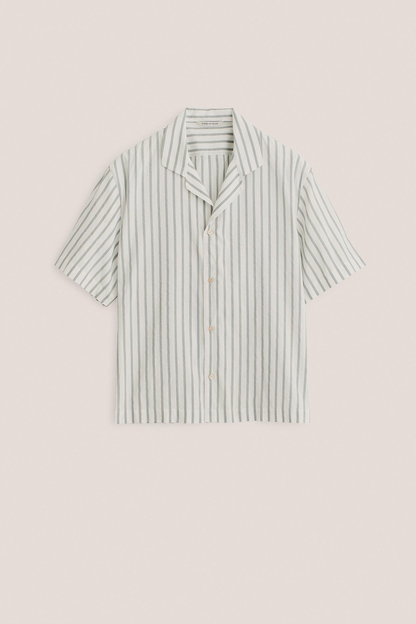 Men's short-sleeved shirt, cotton-silk-linen blend, washed finish, white with subtle green stripes.
