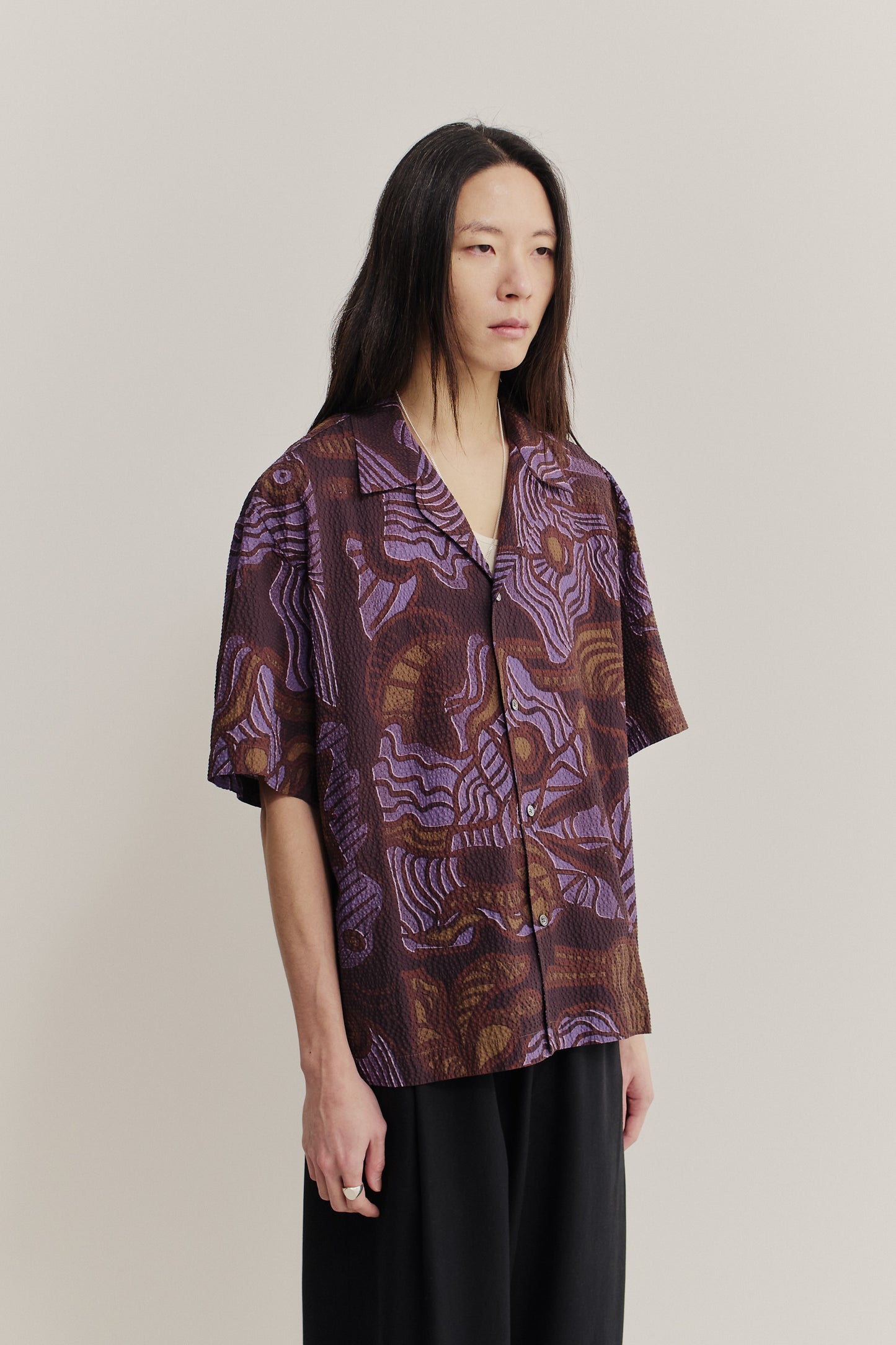 Men's short-sleeved shirt, cotton seersucker, brown and purple African wildlife print.