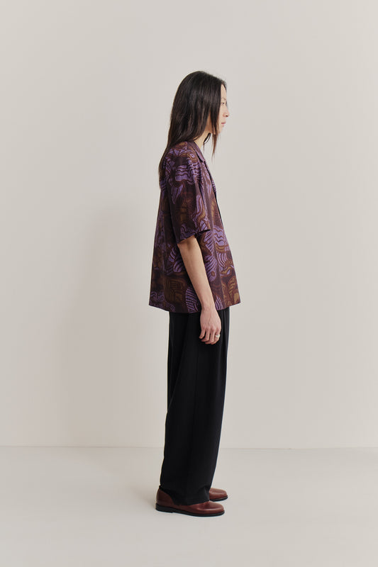 Men's short-sleeved shirt, cotton seersucker, brown with purple African wildlife print.
