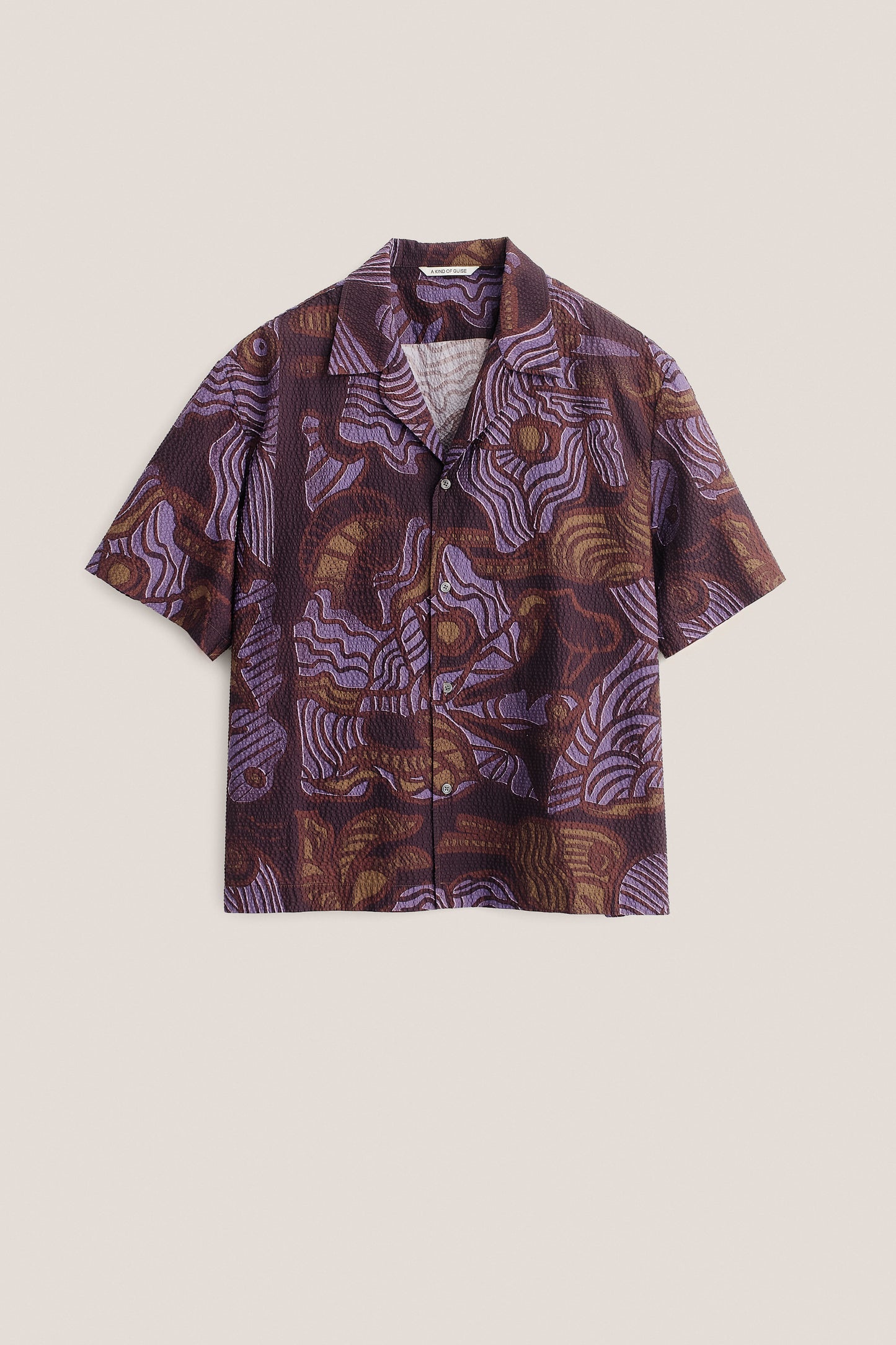 Men's short-sleeved shirt, cotton seersucker, brown with purple African wildlife print.