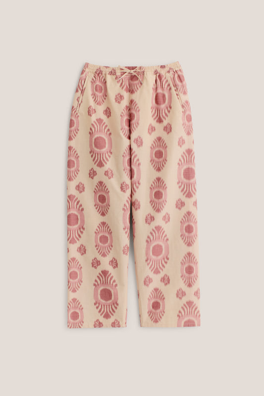 Men's long-pants, cotton and recycled polyester blend, ikat print, beige with red pattern, elastic waist.