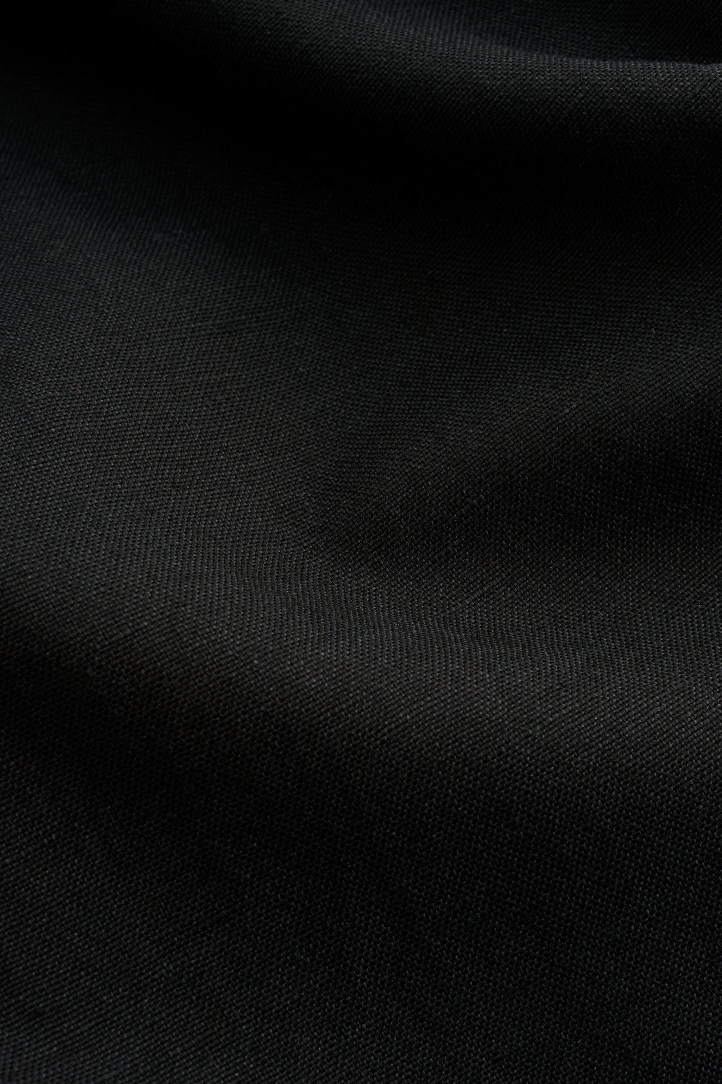 Men's pants, long-pants, worsted wool and linen blend, black, with subtle texture.