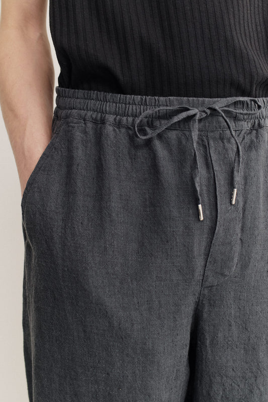 Men's long-pants, 100% linen, plain weave, charcoal, with elasticated waistband and drawstring.