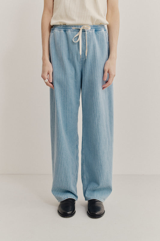 Men's pants, long-pants, organic cotton, washed light blue denim with subtle white pinstripes, elasticated waistband, wide straight fit.