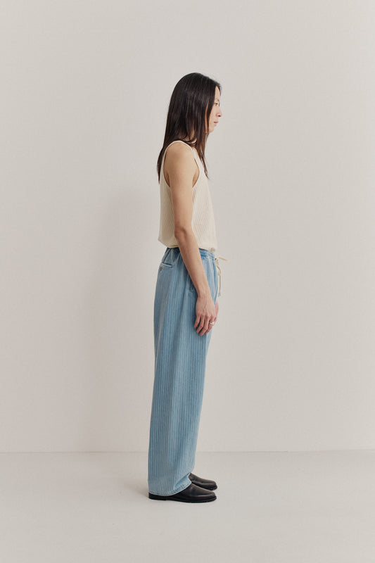 Men's long-pants, organic cotton, washed light blue denim with subtle white pinstripes, elasticated waistband.