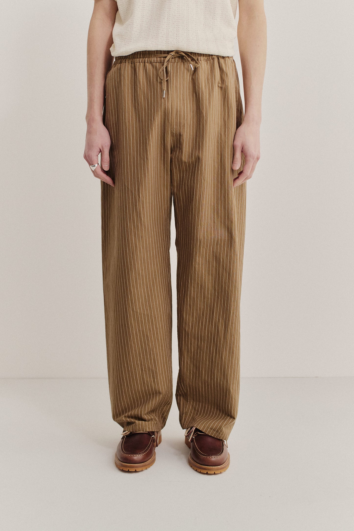 Men's long pants, cotton-linen seersucker, brown with white pinstripes, elastic waist, relaxed leg.