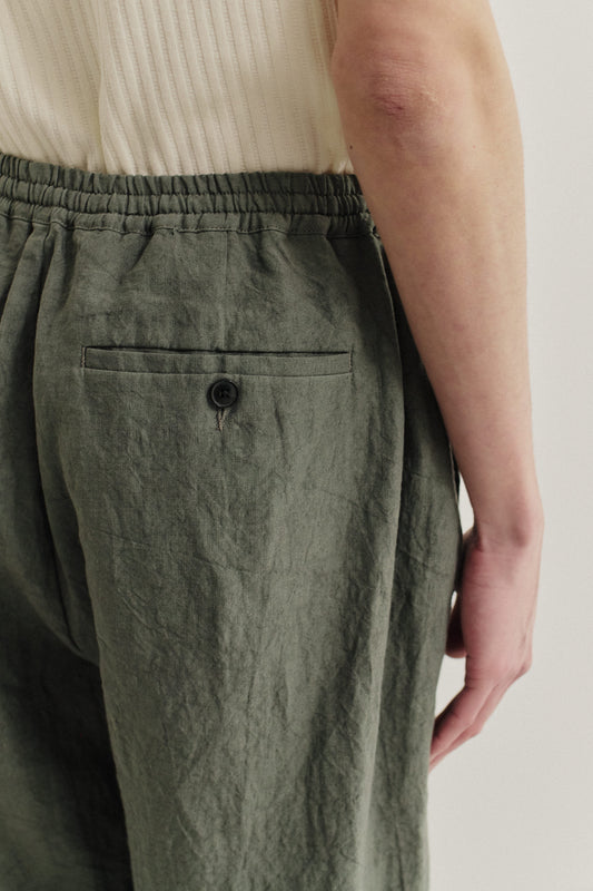 Men's long-pants, Japanese linen, tennpiboshi sun-dried, olive green, with elastic waist and buttoned back welt pocket.