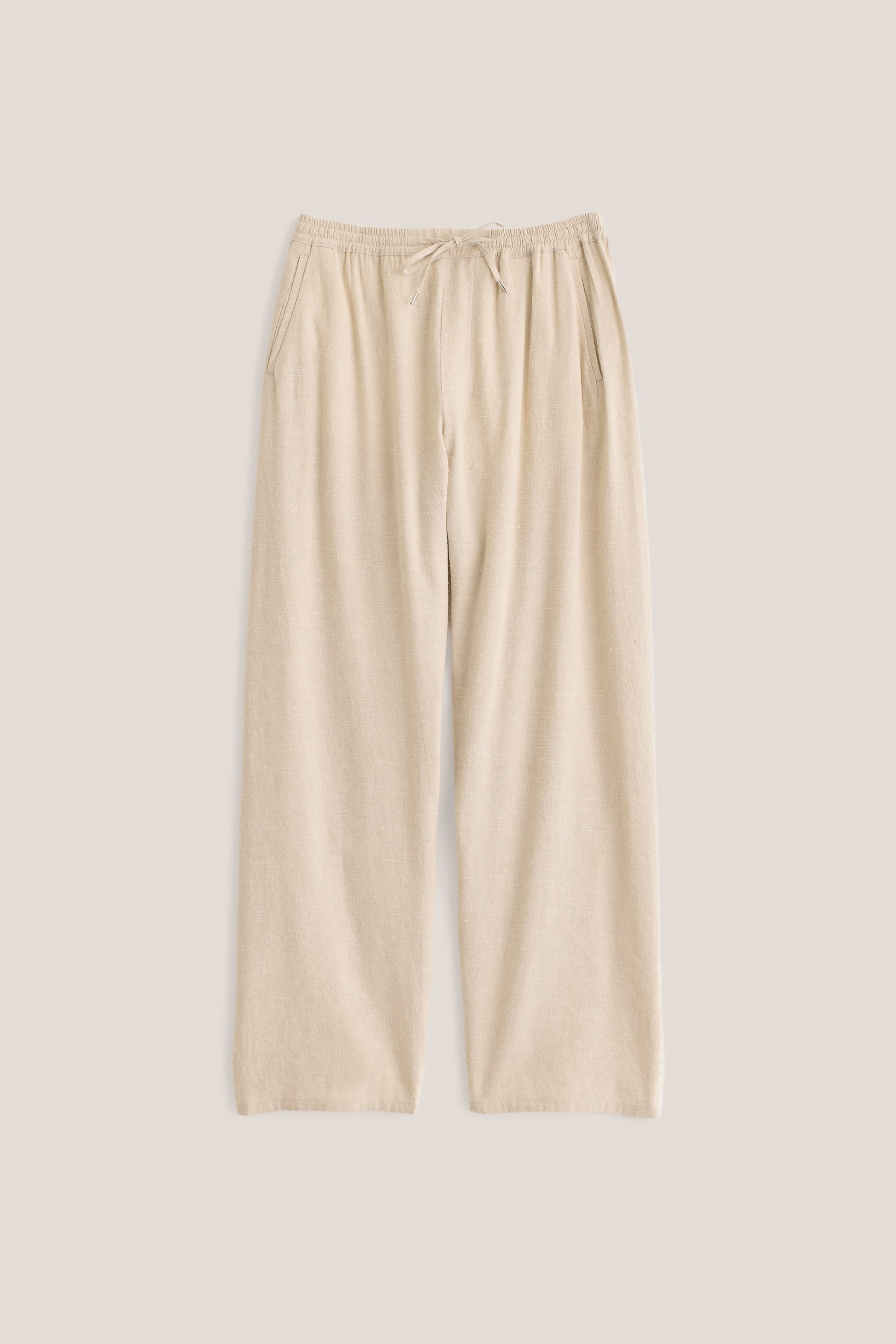 Unisex long-pants, linen silk blend, naturally textured, undyed beige, elasticated waist, wide straight fit.