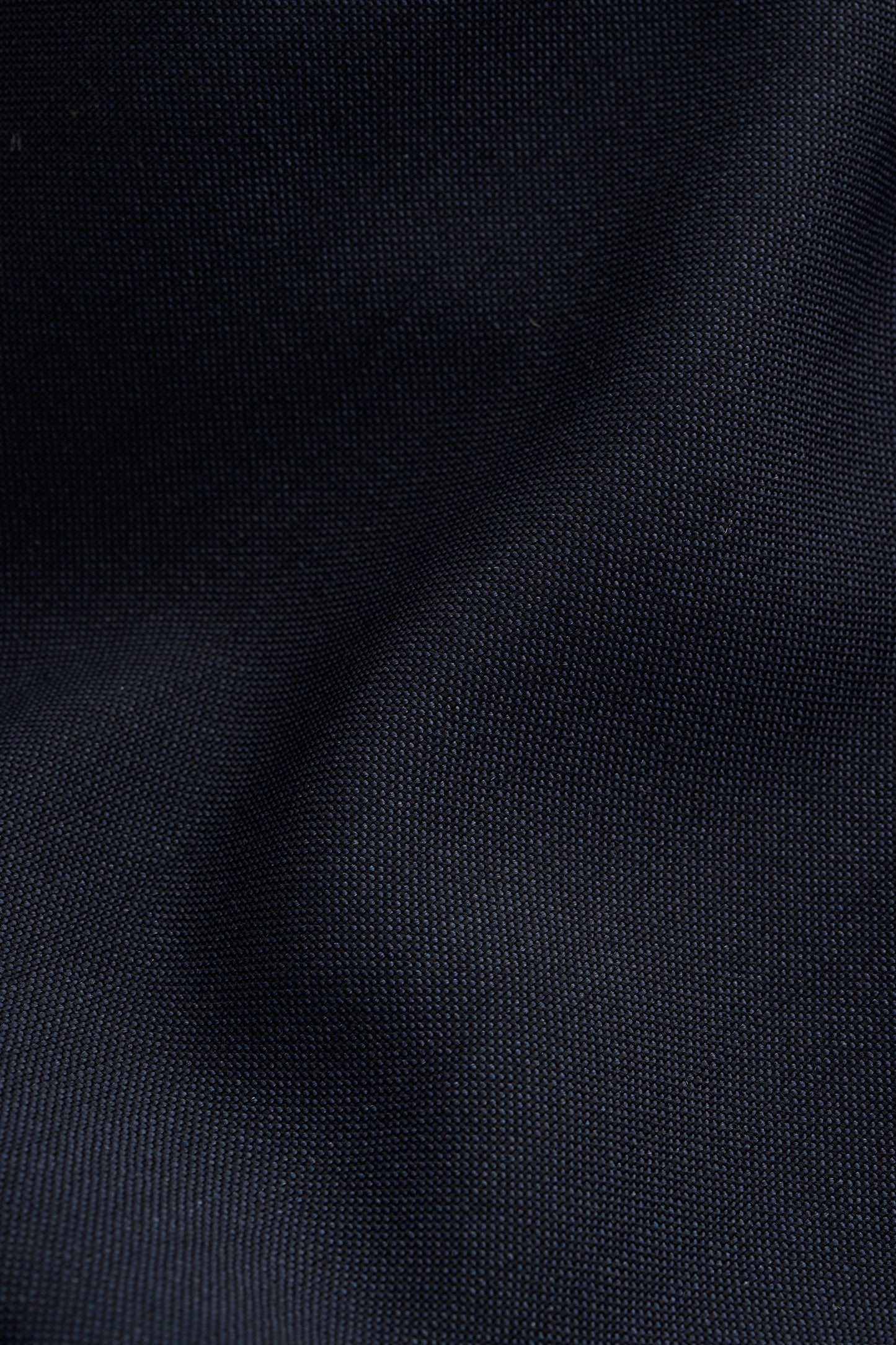 Unisex long-pants, 100% virgin wool, dark navy, lightweight fabric with a crisp hand feel.