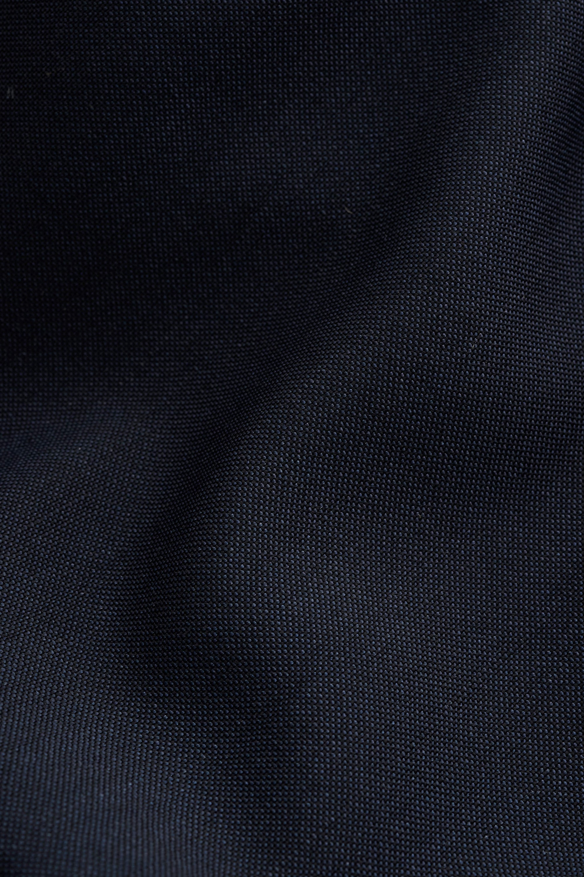 Unisex long-pants, 100% virgin wool, dark navy, lightweight fabric with a crisp hand feel.