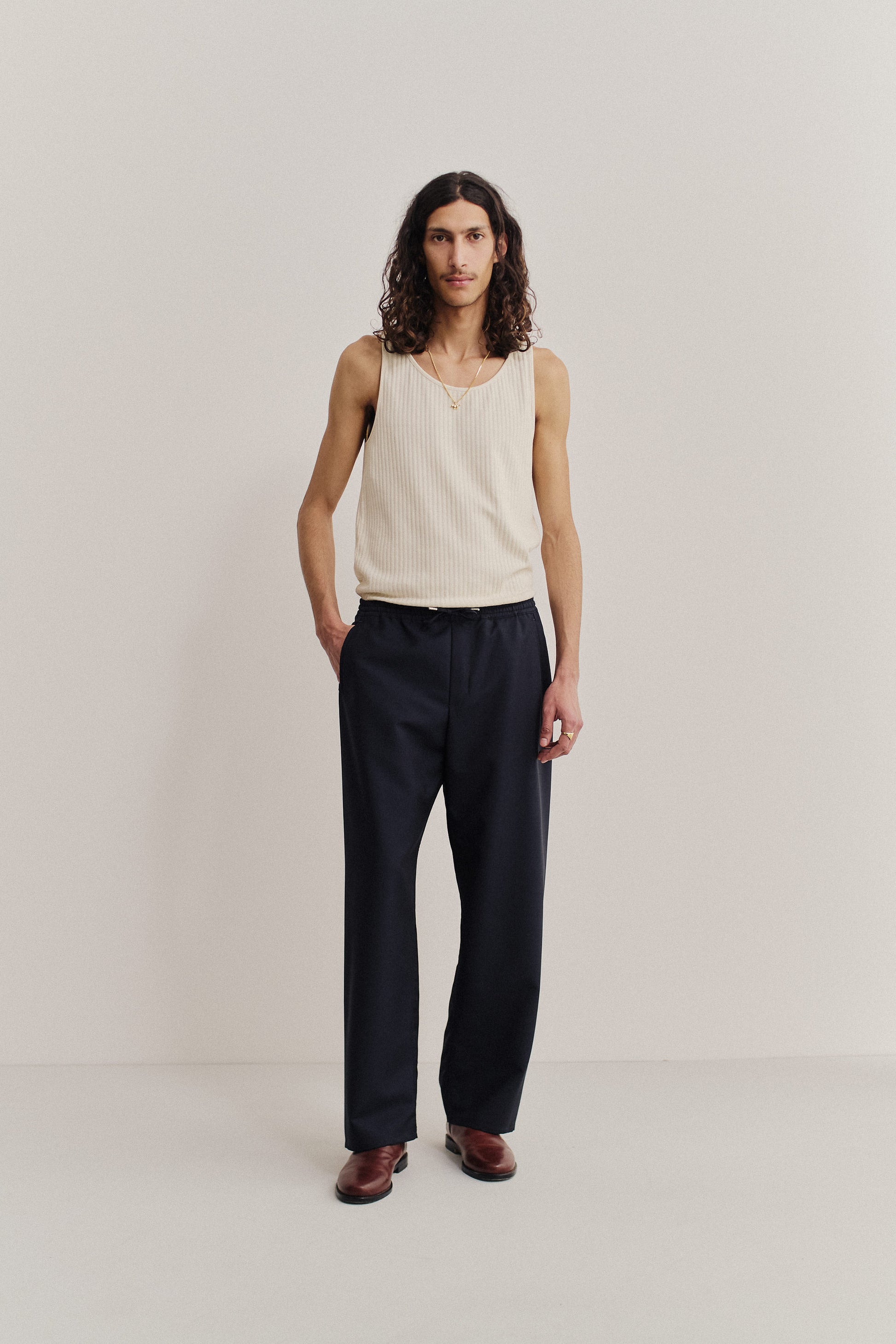 Men's long-pants, 100% virgin wool, dark navy Samurai Trousers with elastic waist and wide straight fit.