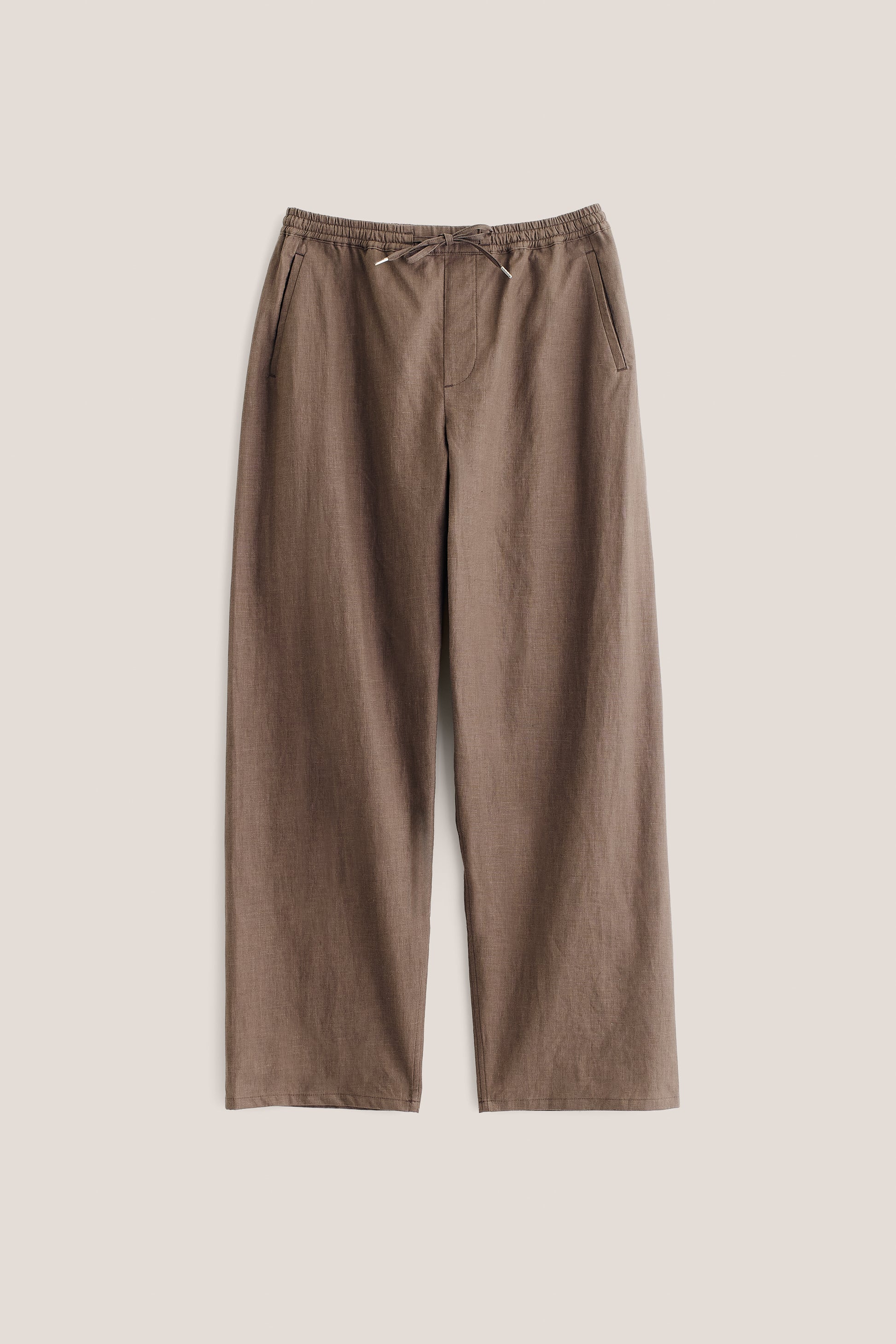 Men's long pants, 100% linen, natural brown, wide straight fit, elasticated waist, welt pockets.