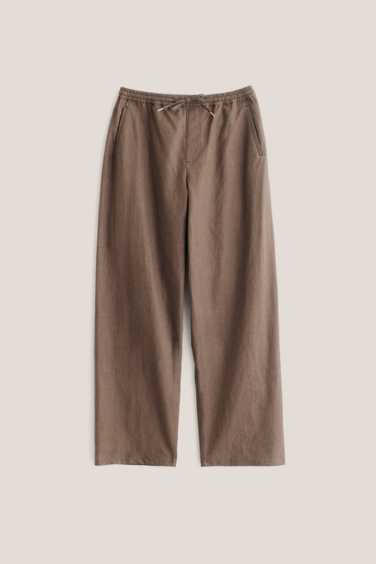 Men's long pants, 100% linen, natural brown, wide straight fit, elasticated waist, welt pockets.