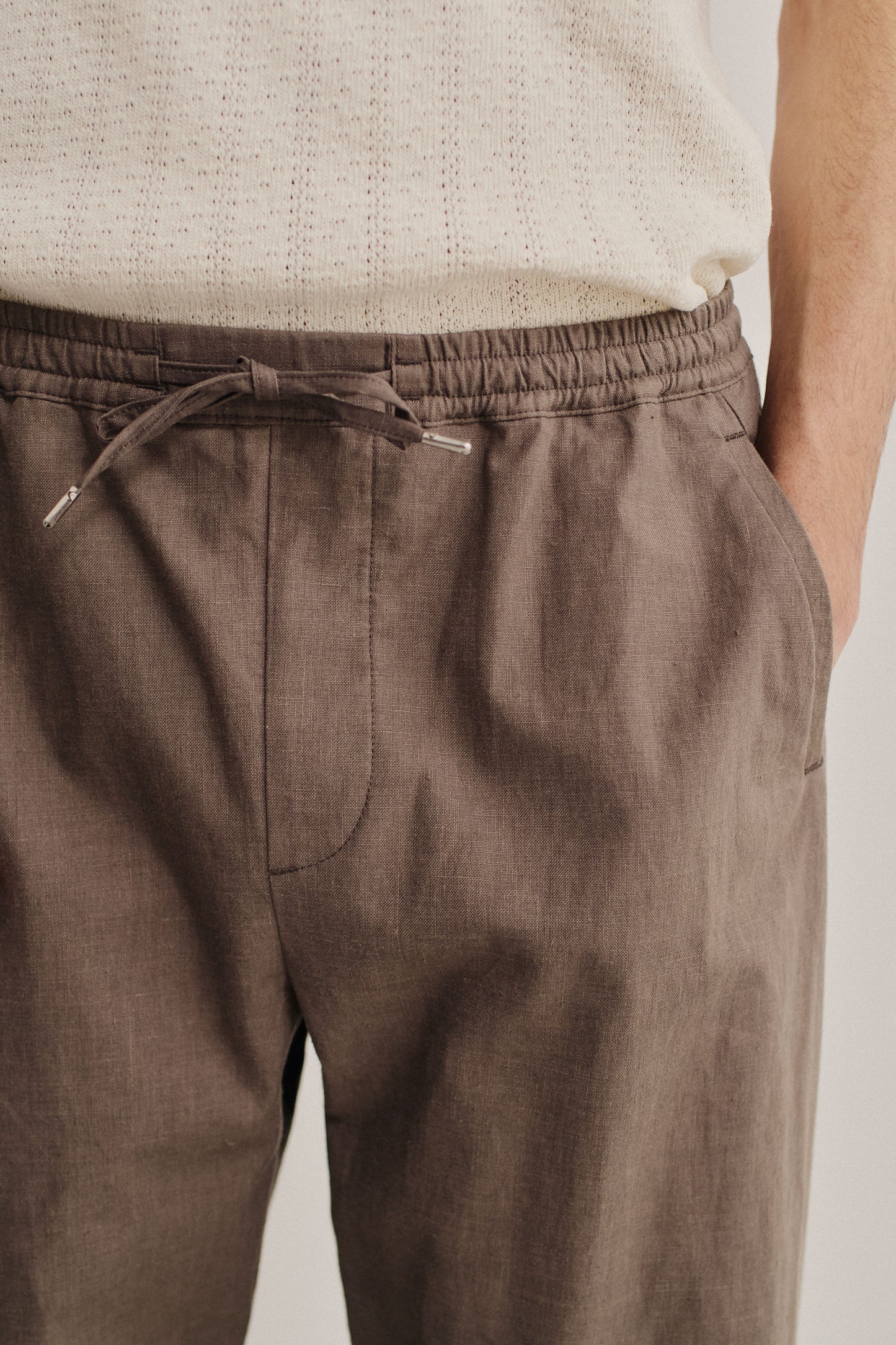 Men's long pants, 100% linen, natural brown, with elasticated waistband and drawstring.