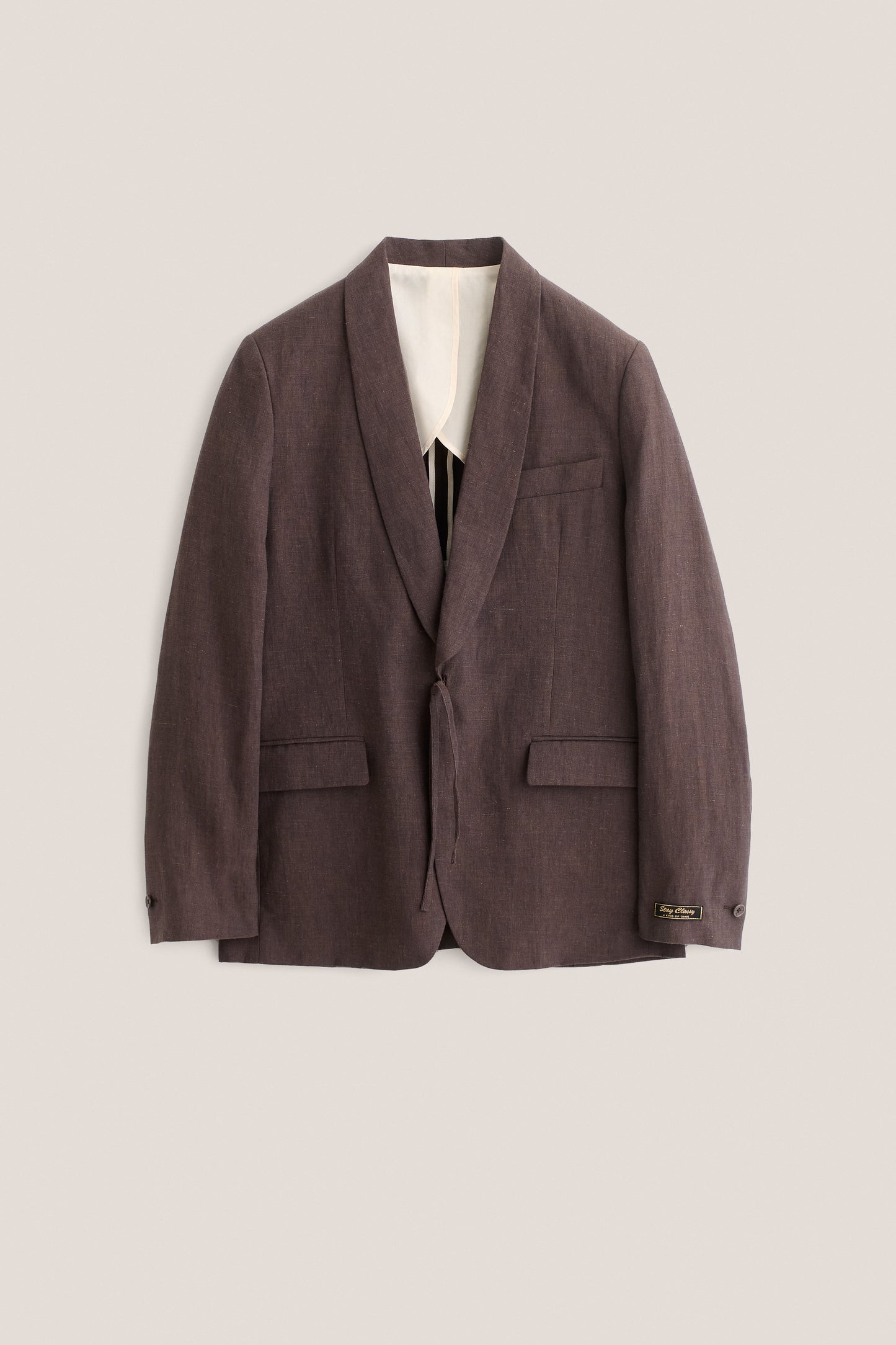 Men's tailoring blazer, 100% linen, burnt umber, with shawl collar, flap pockets, and kimono-inspired cord closure.
