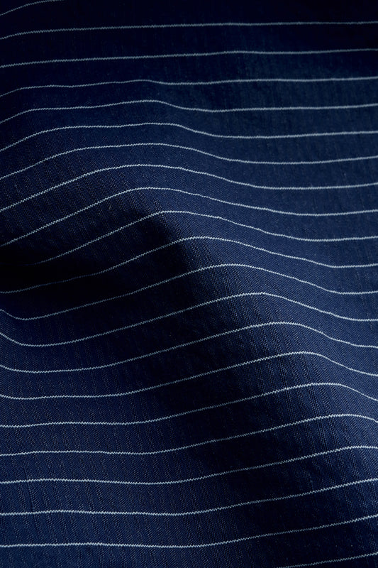 Men's long-pants, cotton-linen seersucker, navy with fine pinstripes.